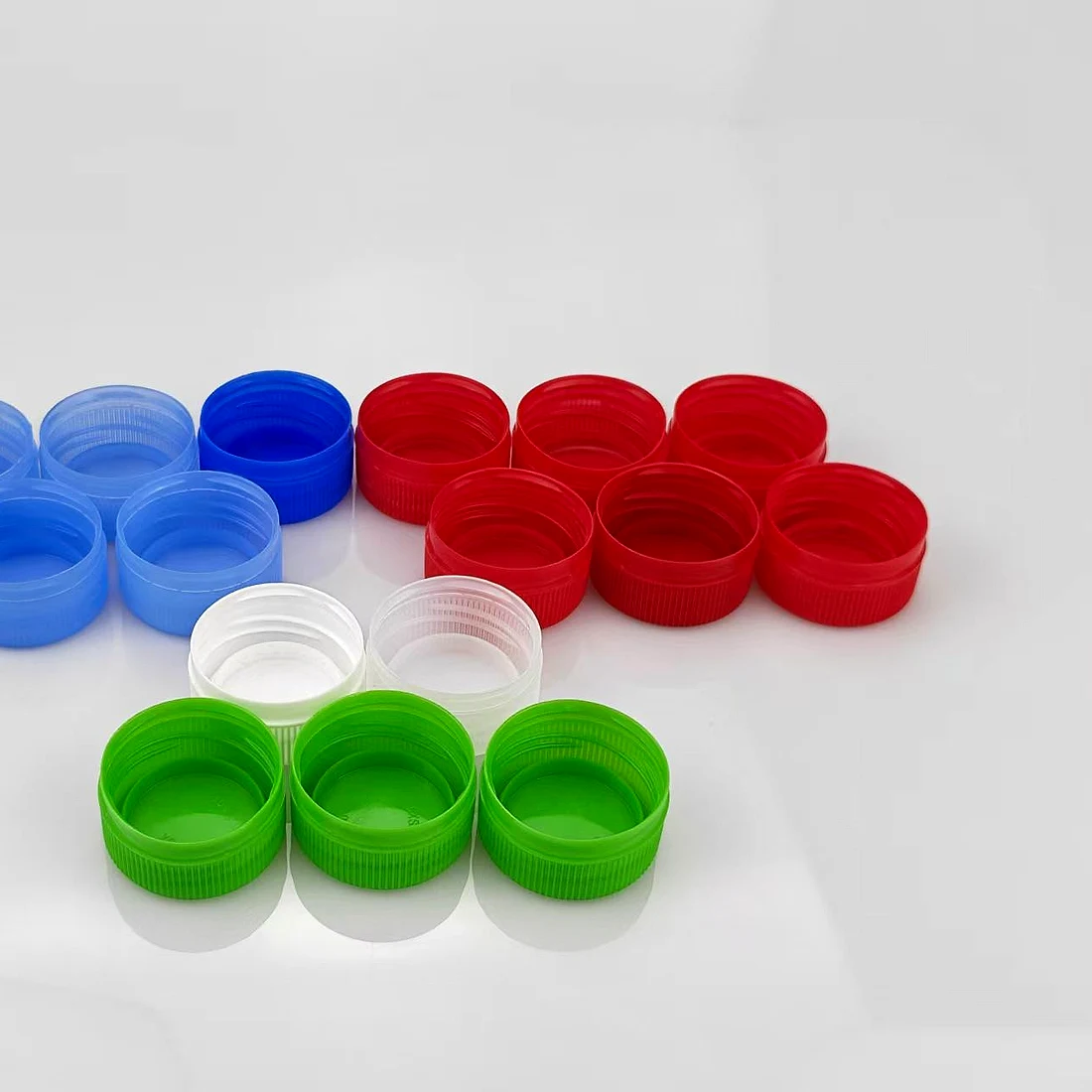 Coloured screw caps for condiment bottles